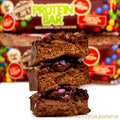 Mountain Joe's Protein Bar Chocolate Candy Cream - proteinowe brownie z karmele, czekoladą i lentilkami by Mountain Joe's (mountain-joe-s-protein-bar-chocolate-candy-cream)