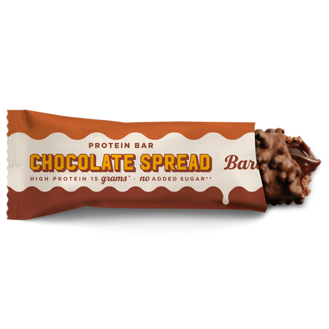 Guiltfree Barebells Protein Bar Chocolate Spread w pomarańczowym opakowaniu z widocznym czekoladowym wnętrzem batona