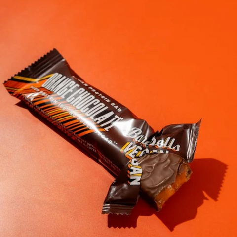 Guiltfree Barebells Vegan Orange Chocolate to wegański baton proteinowy w czekoladzie z pomarańczowym nadzieniem
