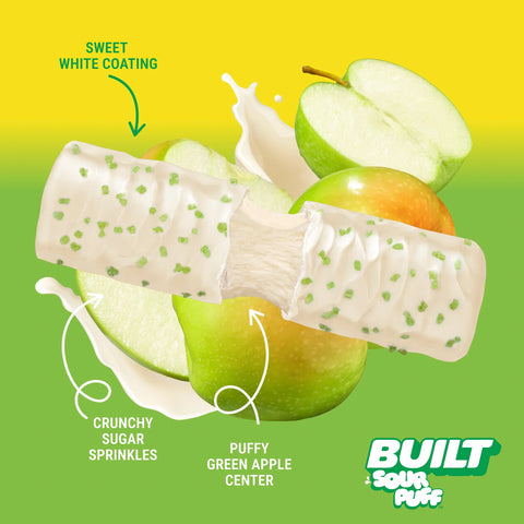 Guiltfree baton proteinowy Built Sour Puff Green Apple z piankowym wnętrzem, białą polewą i zieloną posypką