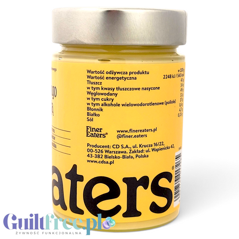 Słoik kremu Guiltfree Finer Eaters z mango i marakują, widoczna etykieta z wartościami odżywczymi na jasnym tle.
