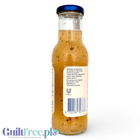 Guiltfree Hellmann’s Fat Free Vinaigrette w szklanej butelce z widocznymi ziołami i kawałkami czerwonej papryki