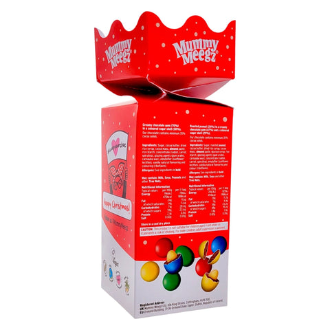 Guiltfree Mummy Meegz M’z Gems Christmas Cracker w czerwonym opakowaniu z wegańskimi drażetkami czekoladowymi