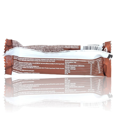 Tylna strona opakowania batona proteinowego Guiltfree Purella Superfoods z tabelą wartości odżywczych