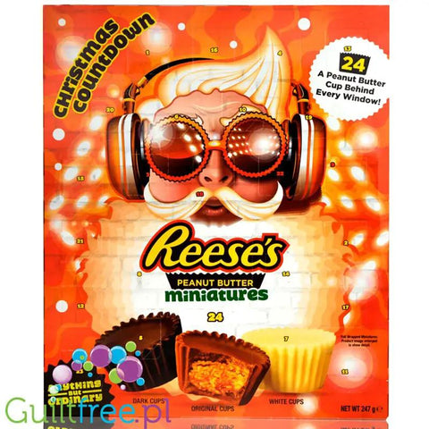 Kalendarz adwentowy Guiltfree Reese's Peanut Butter Cups 2026 z grafiką Mikołaja w słuchawkach i czekoladkami.