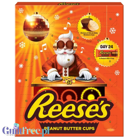 Świąteczny kalendarz adwentowy Guiltfree Reese's 2026 z DJ Mikołajem na pomarańczowym tle i 24 okienkami ze słodyczami.