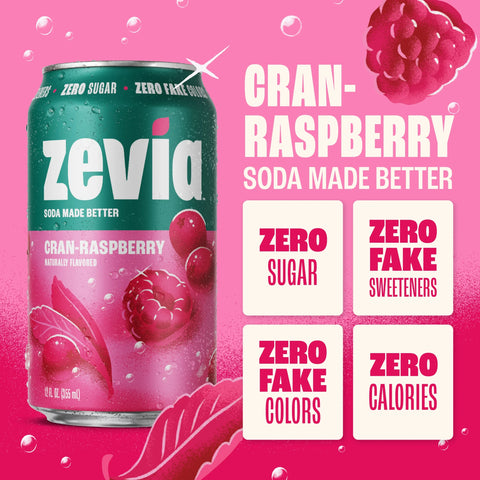 Puszka napoju gazowanego Zevia Cran-Raspberry o smaku malinowo-żurawinowym, bez cukru i kalorii, na różowym tle.